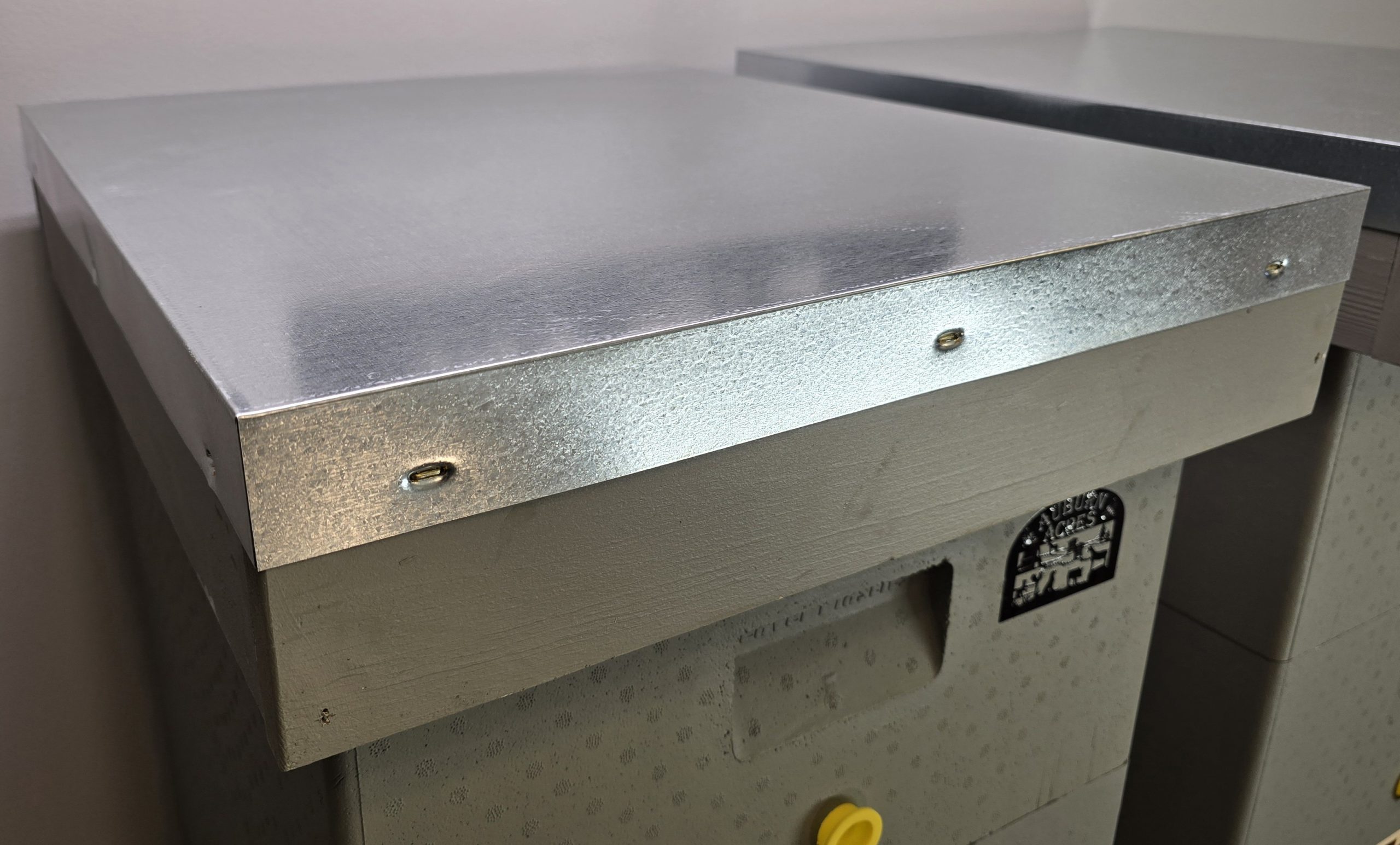 Insulated outside hive cover with metal top